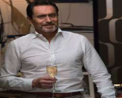 Demian Bichir consuming alcohol